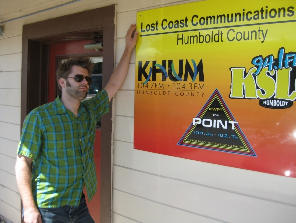 Ivan at KHUM sign