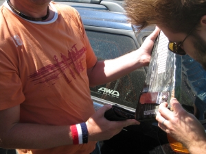Adam an Ivan inspect injured lap steel